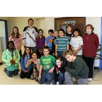 Charlottetown Islanders forward Oliver Cooper with Prince Street School Students