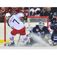 Nick Moutrey of the Lake Erie Monsters Scores against the Manitoba Moose