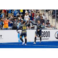 San Diego Sockers' Kraig Chiles exchanges congratulations following a goal