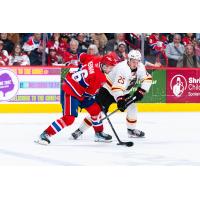 Vancouver Giants defenceman Kolby Gapter (right) vs. the Spokane Chiefs