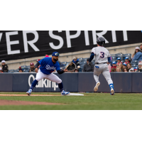 Tulsa Drillers first baseman Aaron Bracho catches the ball to record an out