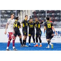 Milwaukee Wave gather after a goal against the Chihuahua Savage