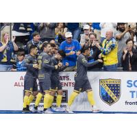 San Diego Sockers celebrate a goal with their supporters