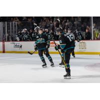 Tahoe Knight Monsters forward Jake McGrew (right) reacts after his goal