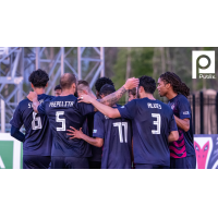 South Georgia Tormenta FC huddle