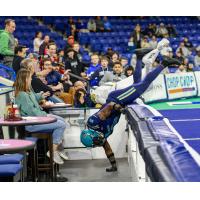 Marquis Waters of the Massachusetts Pirates goes over the wall